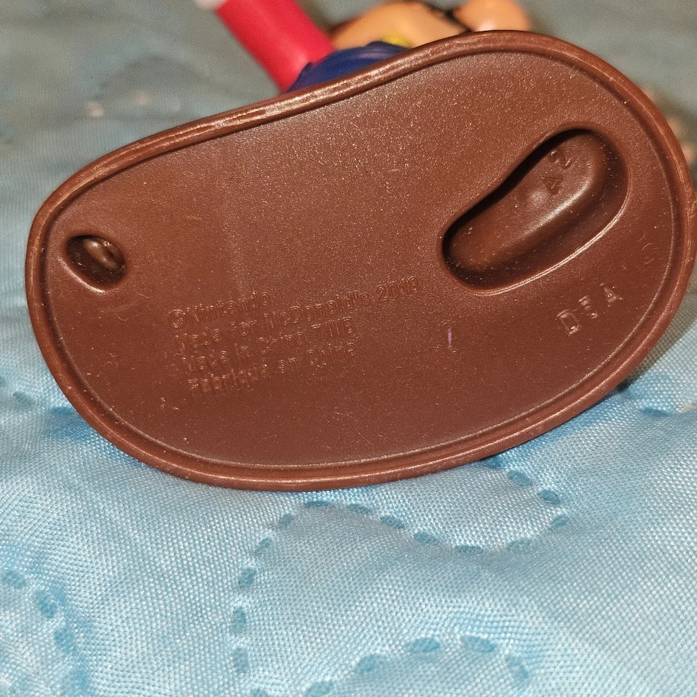 McDonald's Happy Meal toy featuring Mario from the Super Mario Bros. franchise.‎